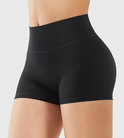 Black high-waisted shorts on a plain background